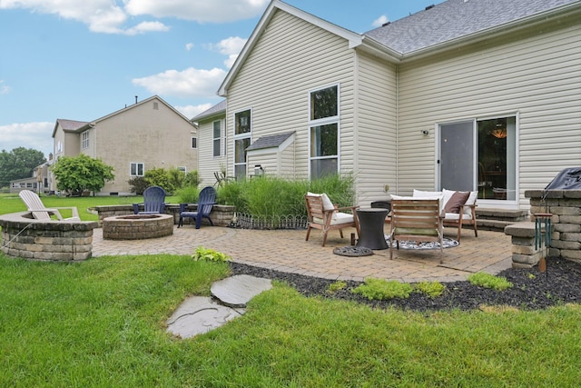 13946 Bainwick Dr NW, Pickerington, OH 43147 - view of patio / terrace with a fire pit