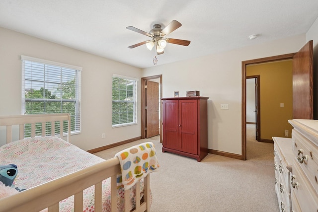 13946 Bainwick Dr NW, Pickerington, OH 43147 - bedroom with light carpet and a ceiling fan