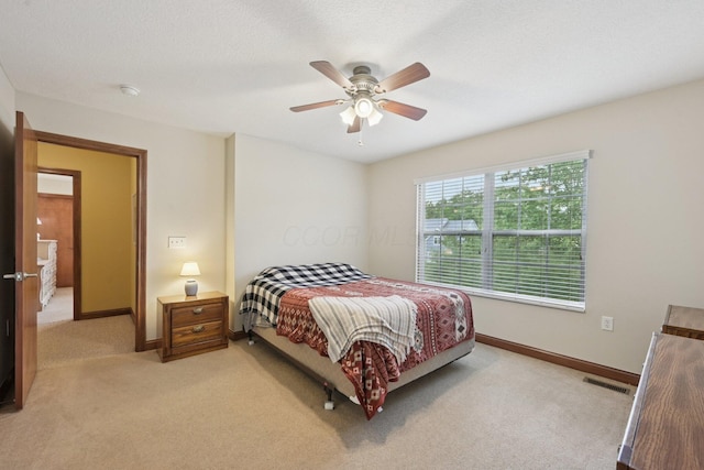 13946 Bainwick Dr NW, Pickerington, OH 43147 - bedroom featuring light colored carpet and ceiling fan