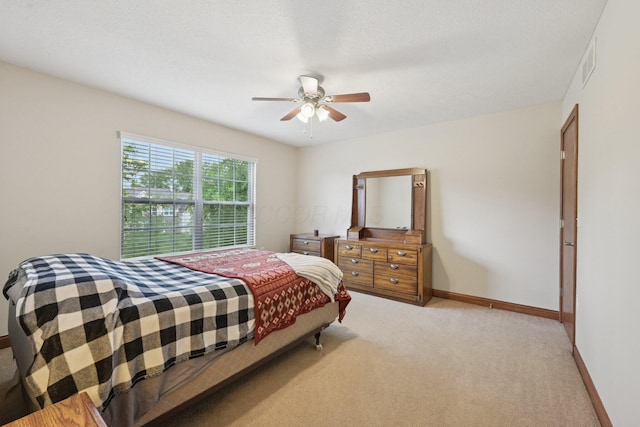 13946 Bainwick Dr NW, Pickerington, OH 43147 - bedroom with light colored carpet and a ceiling fan