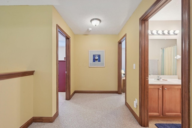 13946 Bainwick Dr NW, Pickerington, OH 43147 - hall with light colored carpet and a textured ceiling