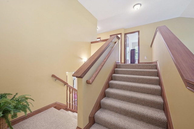 13946 Bainwick Dr NW, Pickerington, OH 43147 - stairway with carpet floors and lofted ceiling