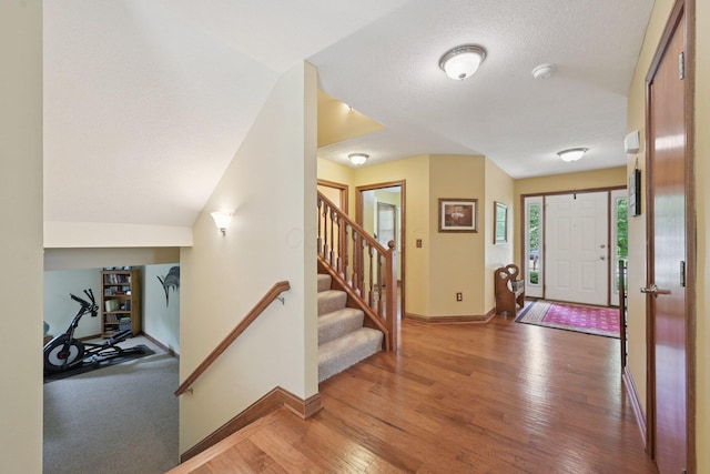 13946 Bainwick Dr NW, Pickerington, OH 43147 - foyer entrance featuring wood finished floors and stairs