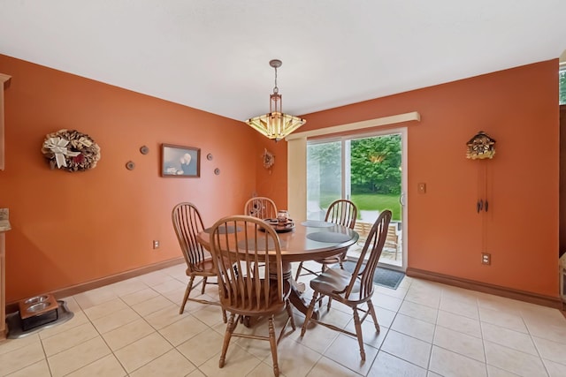 13946 Bainwick Dr NW, Pickerington, OH 43147 - dining room with light tile patterned floors and a chandelier