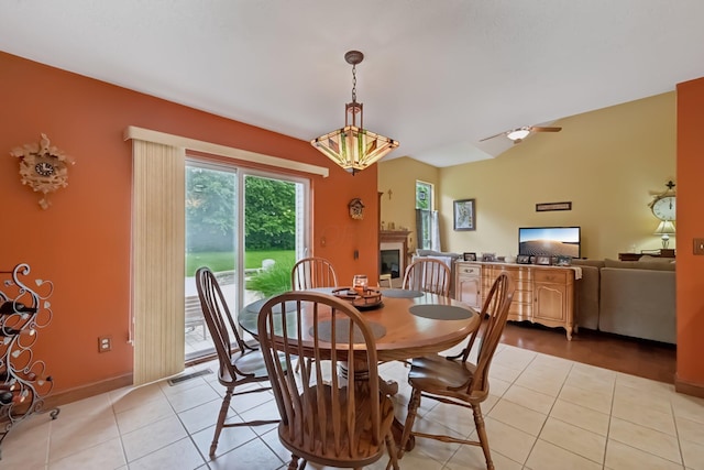 13946 Bainwick Dr NW, Pickerington, OH 43147 - dining space with light tile patterned floors and ceiling fan