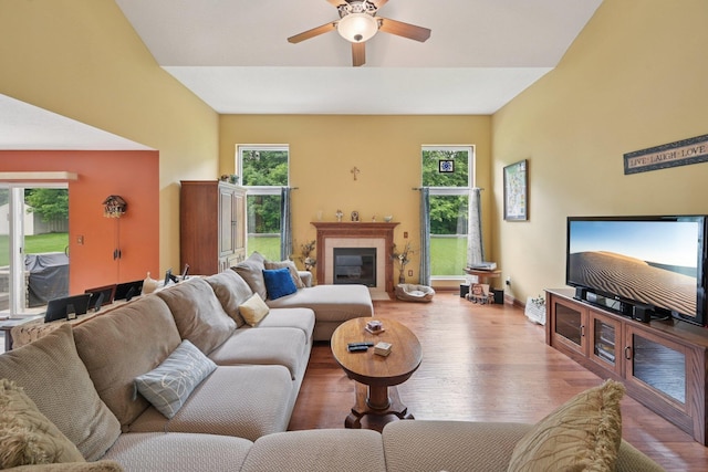 13946 Bainwick Dr NW, Pickerington, OH 43147 - living room with wood finished floors, a ceiling fan, and healthy amount of natural light