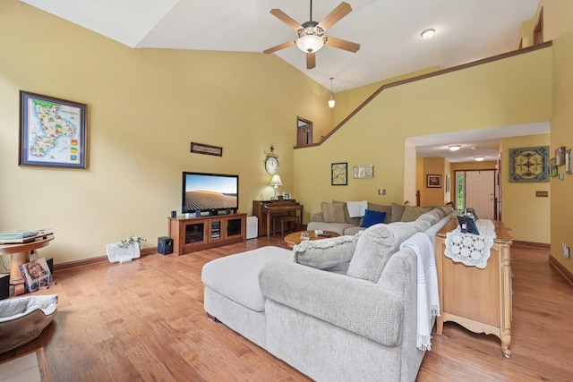 13946 Bainwick Dr NW, Pickerington, OH 43147 - living area featuring ceiling fan, light wood-style floors, and high vaulted ceiling