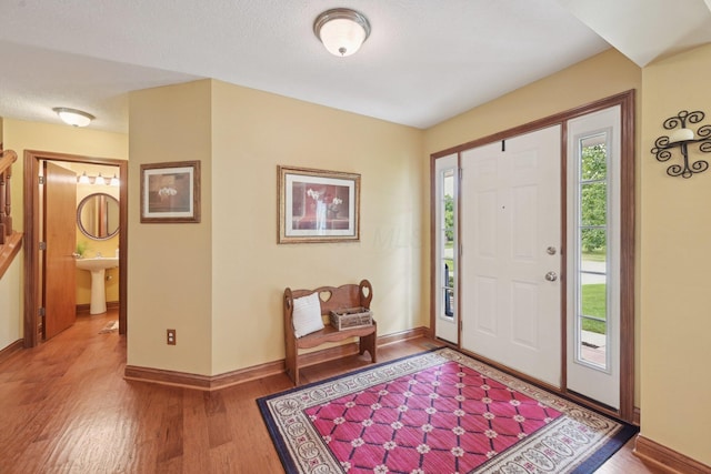 13946 Bainwick Dr NW, Pickerington, OH 43147 - entryway featuring light wood finished floors and baseboards