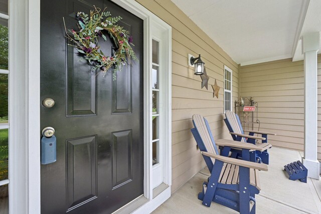 13946 Bainwick Dr NW, Pickerington, OH 43147 - view of exterior entry with covered porch