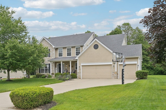 13946 Bainwick Dr NW, Pickerington, OH 43147 - view of front of home with stone siding, a garage, and a front lawn