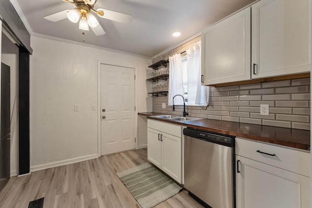 3029 Mcguffey Rd, Columbus, OH 43224 - kitchen featuring dishwasher, ornamental molding, open shelves, decorative backsplash, and wooden counters