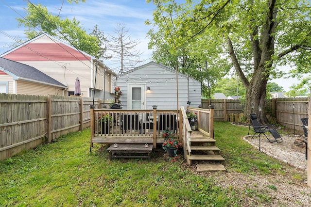3029 Mcguffey Rd, Columbus, OH 43224 - back of property featuring a deck and a fenced backyard