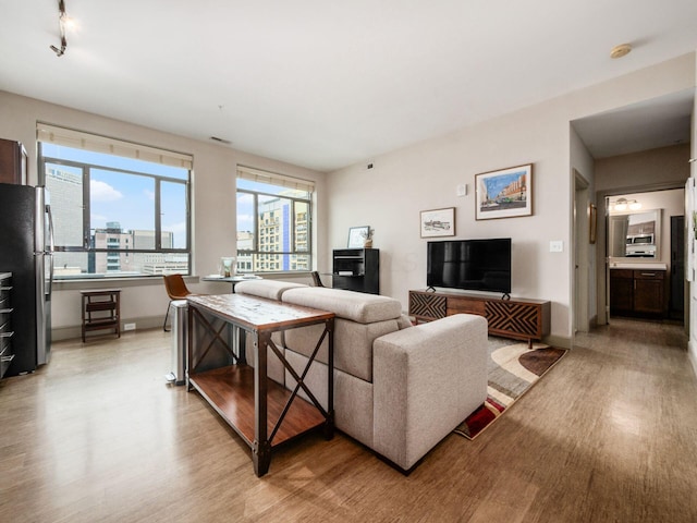 51 N High St Unit 804, Columbus, OH 43215 - living area featuring light wood-style floors