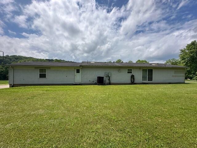 10830 Voris Rd, Logan, OH 43138 - rear view of property with a yard