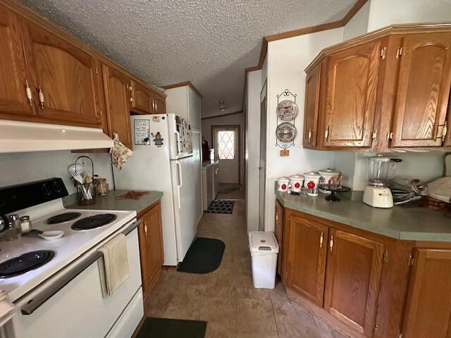10830 Voris Rd, Logan, OH 43138 - kitchen featuring white appliances, range hood, brown cabinetry, and a textured ceiling