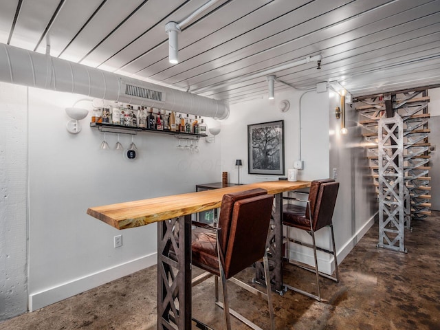 60 E Spring St Unit 214, Columbus, OH 43215 - indoor dry bar featuring concrete flooring and baseboards
