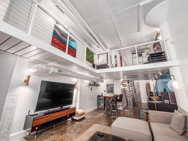 60 E Spring St Unit 214, Columbus, OH 43215 - living room with concrete floors and baseboards
