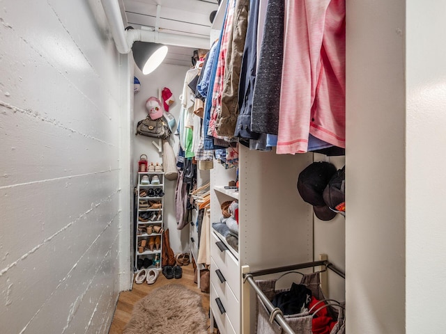 60 E Spring St Unit 214, Columbus, OH 43215 - spacious closet featuring wood finished floors