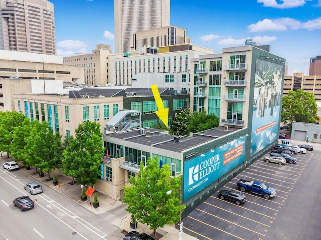 60 E Spring St Unit 214, Columbus, OH 43215 - view of building exterior featuring uncovered parking and a view of city