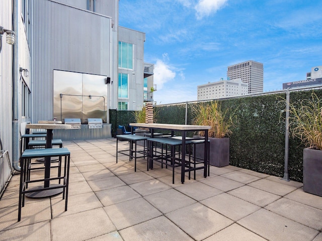 60 E Spring St Unit 214, Columbus, OH 43215 - view of patio / terrace featuring outdoor dining area