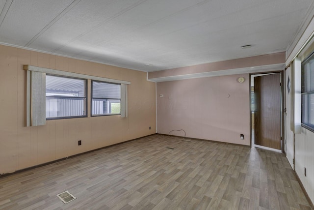 4455 Janice Marie Blvd, Obetz, OH 43207 - unfurnished room featuring wood finished floors and crown molding