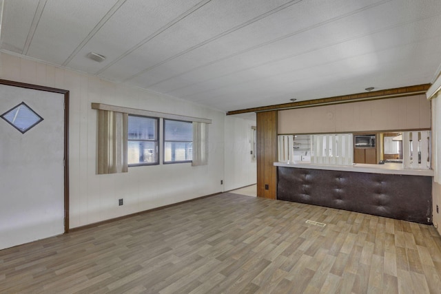 4455 Janice Marie Blvd, Obetz, OH 43207 - unfurnished living room featuring wood finished floors