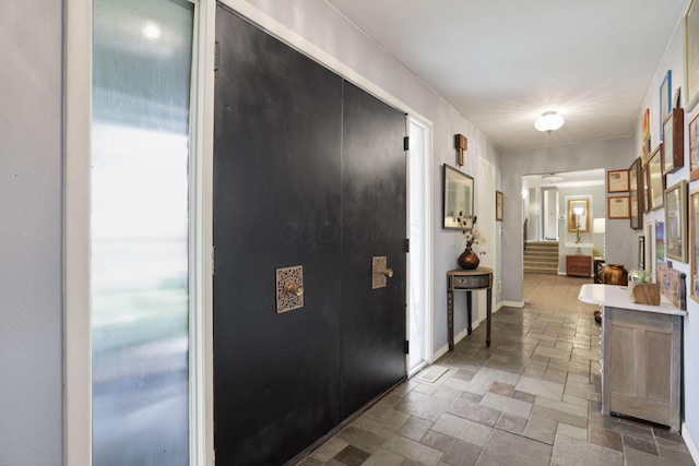 285 E Broad St, Pataskala, OH 43062 - corridor with stone tile flooring and baseboards