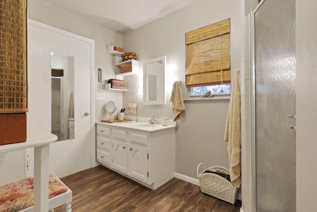 285 E Broad St, Pataskala, OH 43062 - bathroom with wood finished floors, a shower stall, and vanity