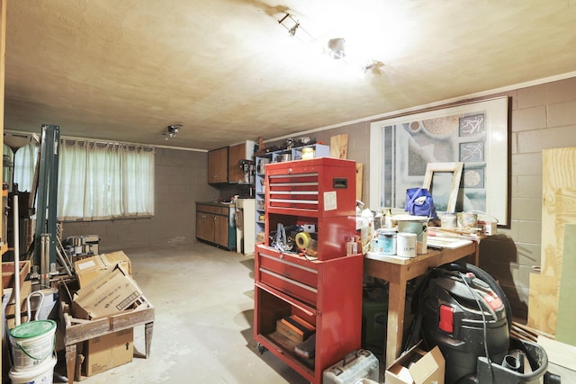 285 E Broad St, Pataskala, OH 43062 - misc room featuring concrete flooring, concrete block wall, and a workshop area