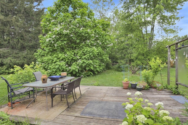 285 E Broad St, Pataskala, OH 43062 - wooden terrace with outdoor dining area and a lawn