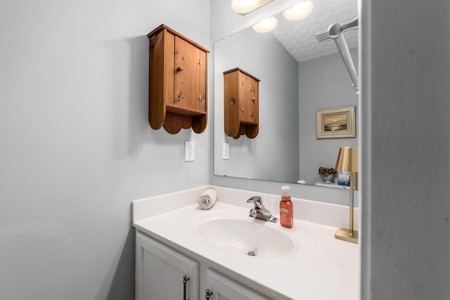 9188 Colonial Commons Dr, Columbus, OH 43240 - bathroom with vanity and a textured ceiling
