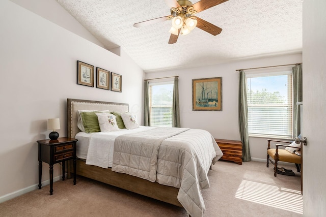9188 Colonial Commons Dr, Columbus, OH 43240 - bedroom featuring carpet, multiple windows, vaulted ceiling, a textured ceiling, and a ceiling fan