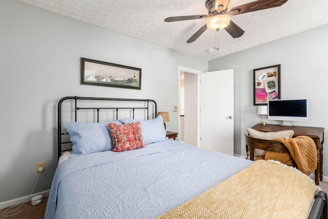 9188 Colonial Commons Dr, Columbus, OH 43240 - bedroom featuring a textured ceiling, carpet flooring, and ceiling fan