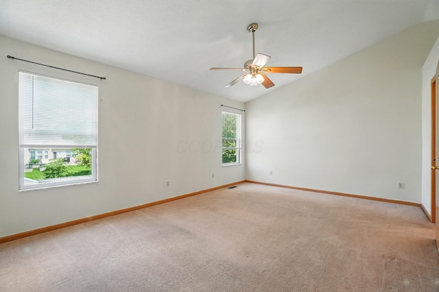 8578 Bivouac Pl, Galloway, OH 43119 - unfurnished room featuring light carpet, vaulted ceiling, and ceiling fan