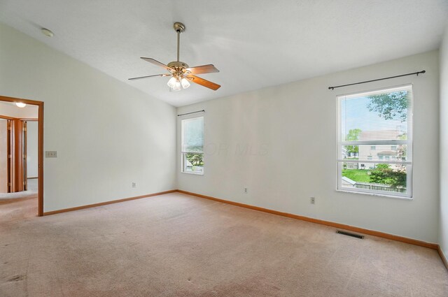 8578 Bivouac Pl, Galloway, OH 43119 - spare room with light carpet, a ceiling fan, and lofted ceiling