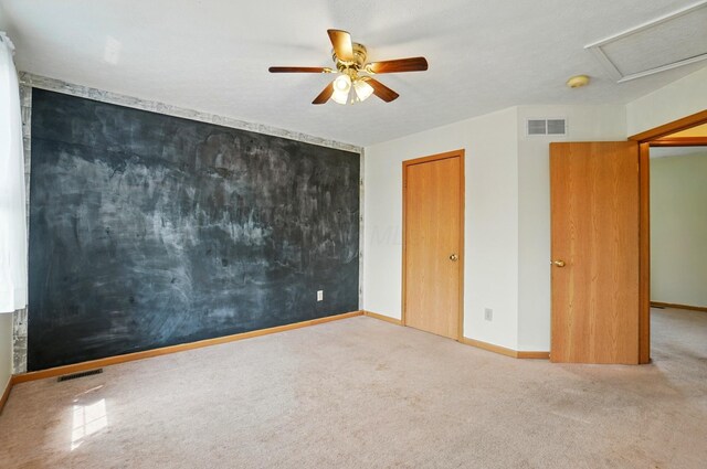8578 Bivouac Pl, Galloway, OH 43119 - unfurnished bedroom featuring carpet floors, attic access, and ceiling fan