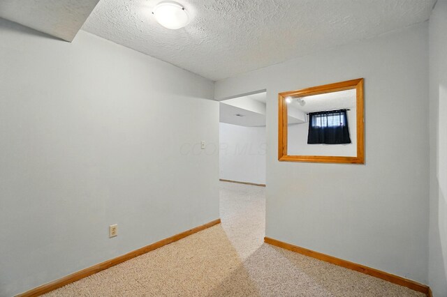 8578 Bivouac Pl, Galloway, OH 43119 - spare room featuring carpet floors and a textured ceiling