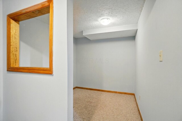 8578 Bivouac Pl, Galloway, OH 43119 - bonus room featuring a textured ceiling and carpet flooring
