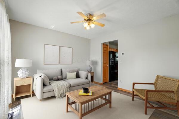 8578 Bivouac Pl, Galloway, OH 43119 - living room with a ceiling fan and baseboards