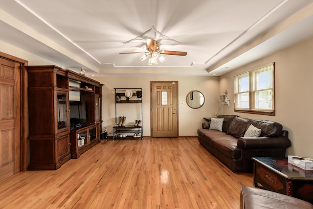 4005 Curtis Ave, Grove City, OH 43123 - living area featuring a raised ceiling, light wood finished floors, and ceiling fan
