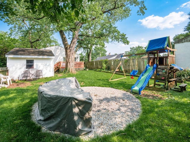 4005 Curtis Ave, Grove City, OH 43123 - fenced backyard with a playground and a wooden deck