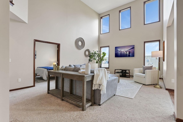 101 Stirling Way, Etna, OH 43062 - carpeted living room with a high ceiling and plenty of natural light