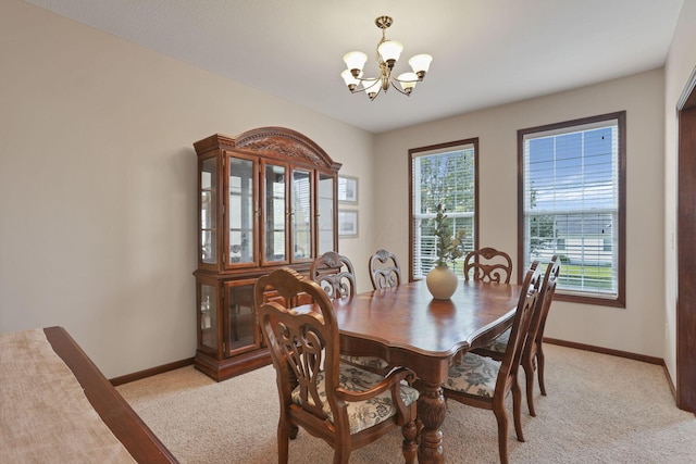 101 Stirling Way, Etna, OH 43062 - dining area featuring a chandelier and light colored carpet