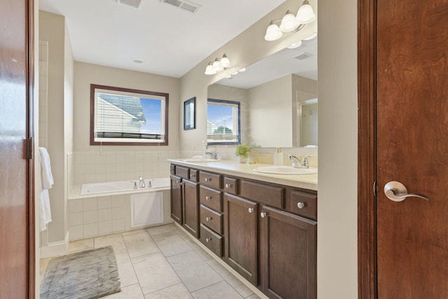 101 Stirling Way, Etna, OH 43062 - bathroom featuring double vanity, a bath, and tile patterned floors