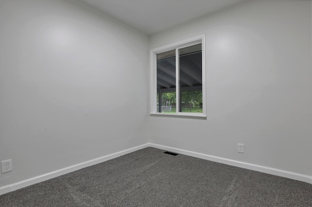 2870 Hamilton Ave, Columbus, OH 43224 - unfurnished room featuring dark colored carpet and baseboards