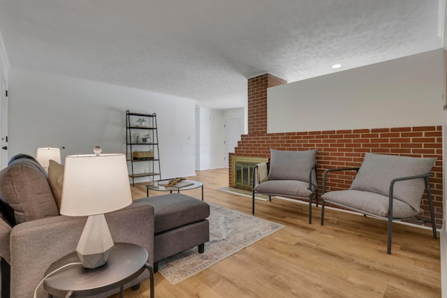2870 Hamilton Ave, Columbus, OH 43224 - living area with light wood finished floors and a textured ceiling