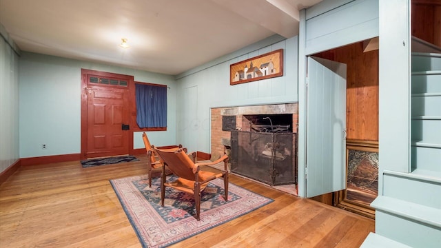 24000 State Route 180, Rockbridge, OH 43149 - dining area featuring light wood-style floors and a fireplace