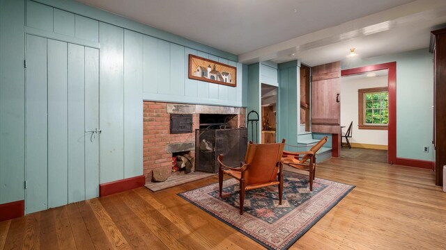 24000 State Route 180, Rockbridge, OH 43149 - dining space with a fireplace and light wood-type flooring