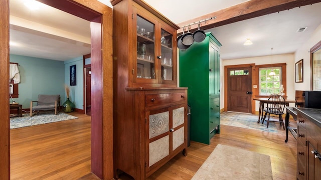 24000 State Route 180, Rockbridge, OH 43149 - entrance foyer with light wood-type flooring and beamed ceiling