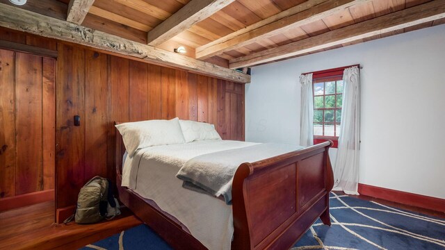 24000 State Route 180, Rockbridge, OH 43149 - bedroom with a wood ceiling with exposed beams and baseboards